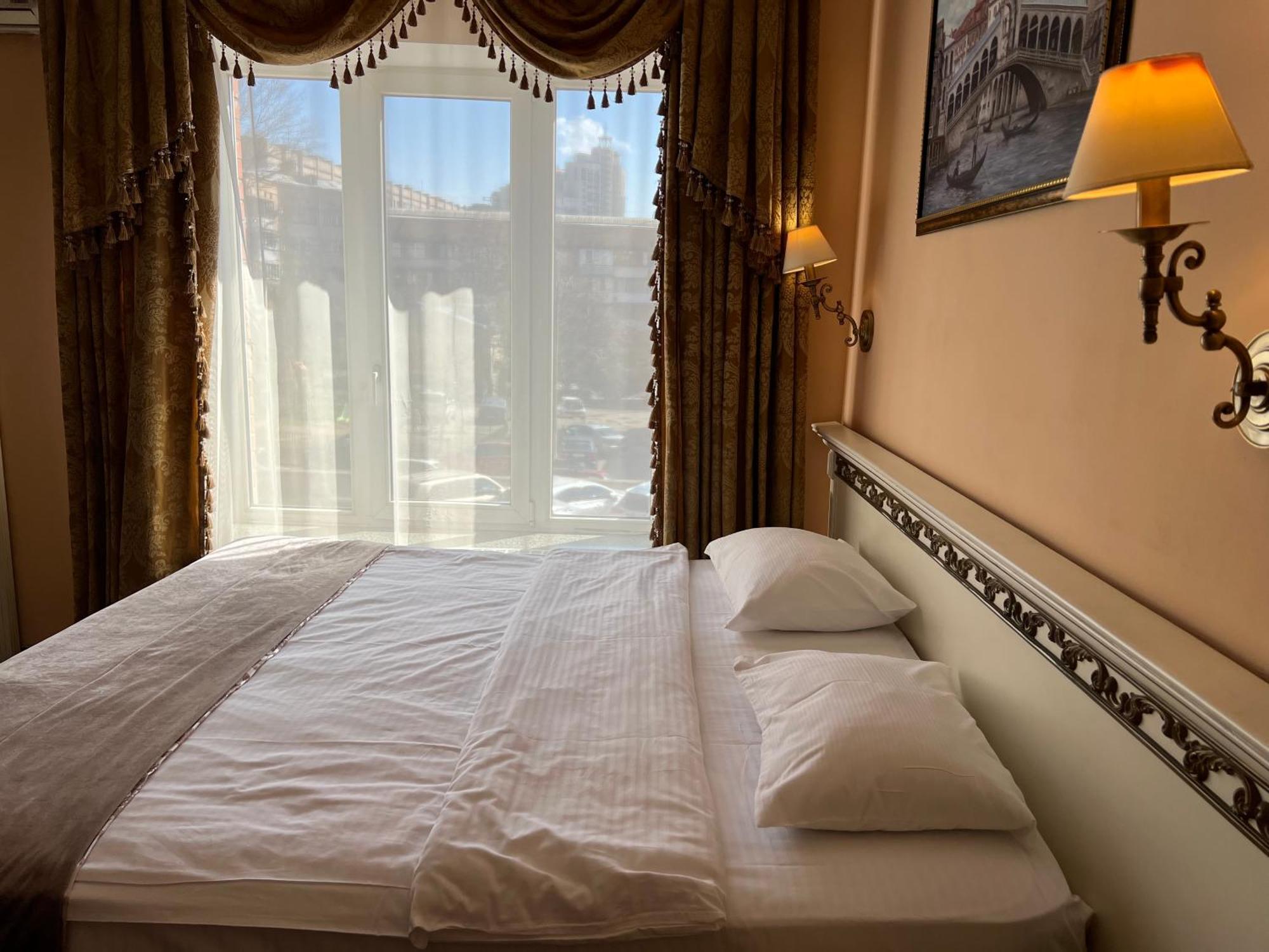 Royal City Hotel Kyiv Quarto foto